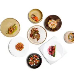 Assaggi gourmet: cosa mangiare a Tuscania? Piatti raffinati con pesce, carne e verdure, un'esplosione di sapori.
