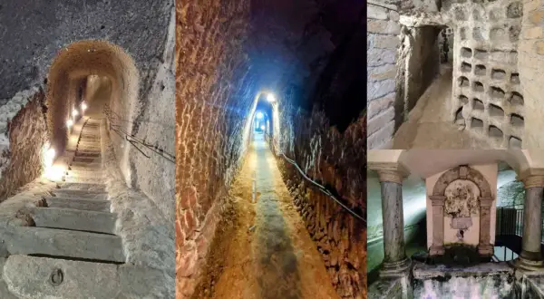Sotterranei del borgo medievale di Orte: scale scavate nella roccia, cunicoli illuminati e nicchie antiche.